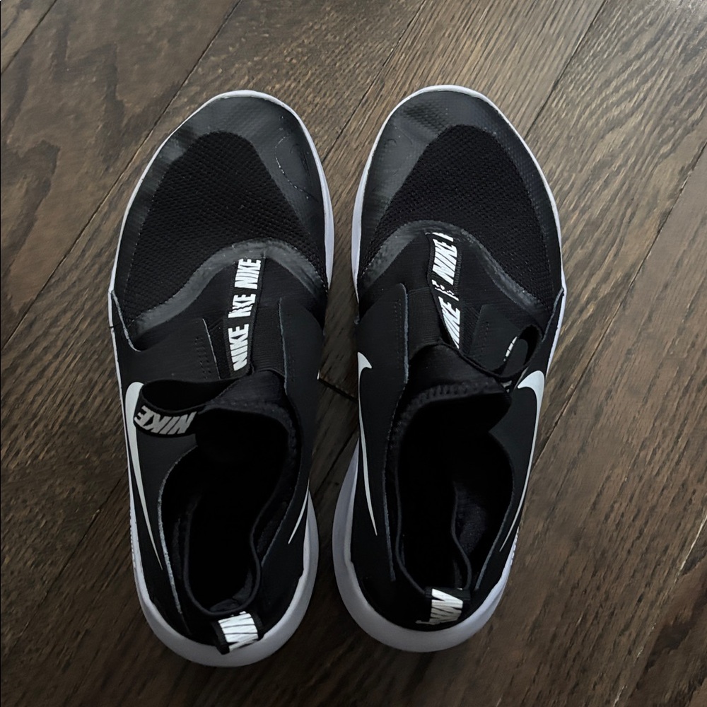 Nike Black and White Athletic Slip-Ons